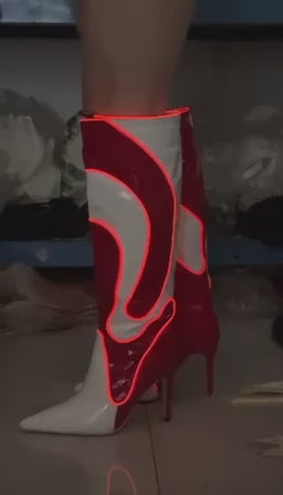 Glow Swirl light-up boots glowing red, front view